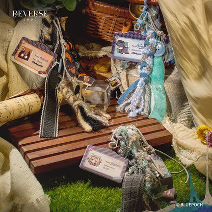 Reverse: 1999 "Little Travel Buddy" Character Lanyard